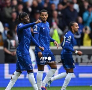 Chelsea's English midfielder #11 Noni Madueke (C) celebrates after scoring their fifth goal during the English Premier League football match between Wolverhampton Wanderers and Chelsea at the Molineux stadium in Wolverhampton, central England on August 25, 2024 [Credit: AFP]